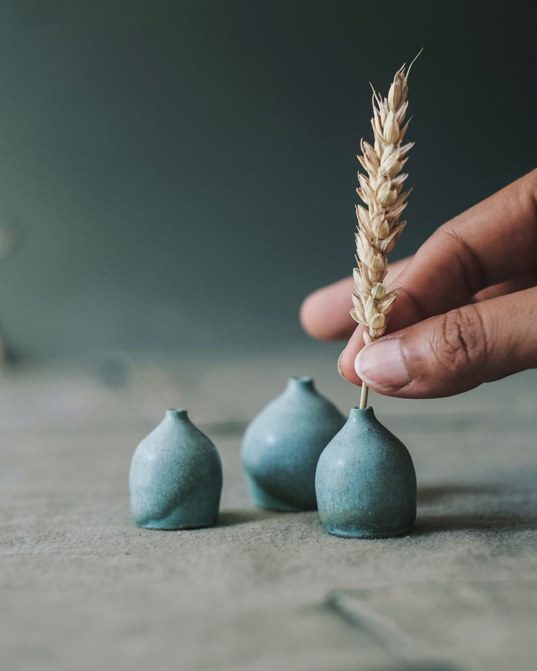 Tiny blue ceramic vases. Handcrafted by Leela Chakravarti @leelapottery